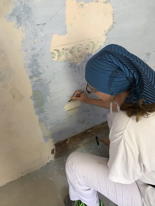 Simonetta exposing 18th century frescoes under the many coats of paint